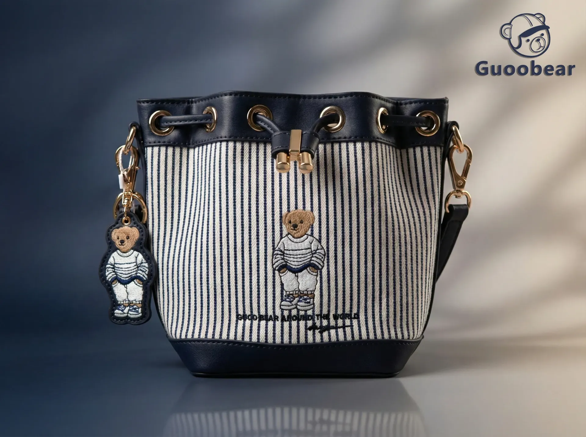 [GU1570-24820] Blue and white striped canvas embroidered bucket bag